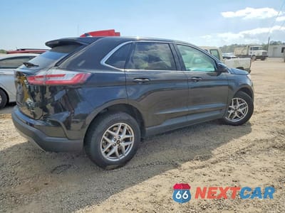 Trzecie zdjęcie samochodu z tyłu: 2023 FORD EDGE SEL VIN:2FMPK4J9XPBA46761 - miniatura