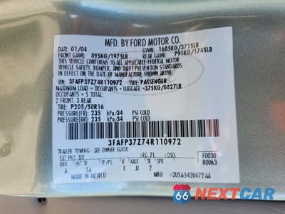 Zdjęcie 13 z 14 samochodu: 2004 FORD FOCUS ZX5 VIN:3FAFP37Z74R110972 - miniatura