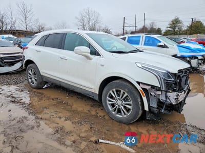 Czwarte zdjęcie samochodu z boku: 2021 CADILLAC XT5 PREMIUM LUXURY VIN:1GYKNCR44MZ153980 - miniatura