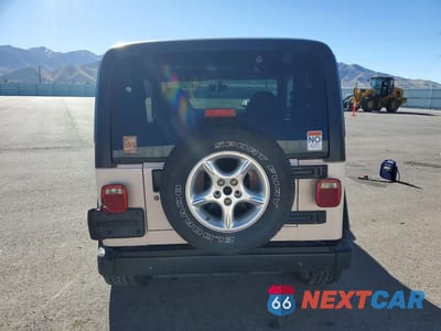 Zdjęcie 6 z 13 samochodu: 1997 JEEP WRANGLER / TJ SAHARA VIN:1J4FY49S4VP514604 - miniatura