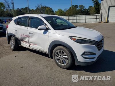 Czwarte zdjęcie samochodu z boku: 2016 HYUNDAI TUCSON SE VIN:KM8J33A48GU177067 - miniatura