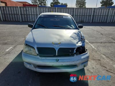 Piąte zdjęcie samochodu w środku: 2002 MITSUBISHI LANCER ES VIN:JA3AJ26EX2U081602 - miniatura