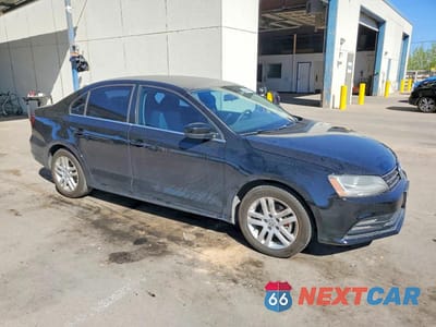 Czwarte zdjęcie samochodu z boku: 2017 VOLKSWAGEN JETTA S VIN:3VW2B7AJ3HM366611 - miniatura