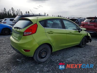 Trzecie zdjęcie samochodu z tyłu: 2011 FORD FIESTA SES VIN:3FADP4FJ3BM168404 - miniatura