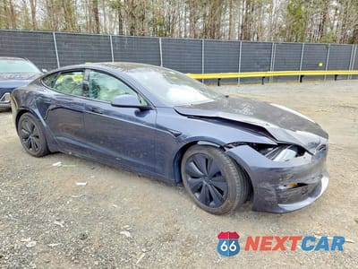 Czwarte zdjęcie samochodu z boku: 2023 TESLA MODEL S VIN:5YJSA1E52PF530014 - miniatura