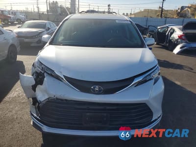 Piąte zdjęcie samochodu w środku: 2022 TOYOTA SIENNA XLE 7-PASSENGER VIN:5TDJRKEC9NS134888 - miniatura