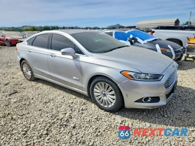 Czwarte zdjęcie samochodu z boku: 2014 FORD FUSION SE PHEV VIN:3FA6P0PU8ER307007 - miniatura