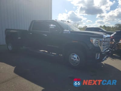 Czwarte zdjęcie samochodu z boku: 2020 GMC SIERRA K3500 DENALI VIN:1GT49WEY5LF333904 - miniatura