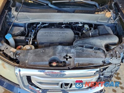 Zdjęcie 11 z 12 samochodu: 2011 HONDA PILOT EX VIN:5FNYF4H46BB008429 - miniatura