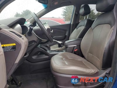 Zdjęcie 7 z 12 samochodu: 2013 HYUNDAI TUCSON LIMITED VIN:KM8JU3AC0DU774214 - miniatura