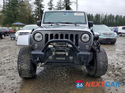 Piąte zdjęcie samochodu w środku: 2017 JEEP WRANGLER UNLIMITED SPORT VIN:1C4BJWDG2HL593113 - miniatura
