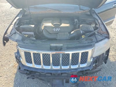 Zdjęcie 12 z 13 samochodu: 2013 JEEP GRAND CHEROKEE OVERLAND VIN:1C4RJECG9DC526108 - miniatura