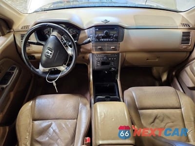 Zdjęcie 8 z 12 samochodu: 2004 HONDA PILOT EXL VIN:2HKYF185X4H525857 - miniatura