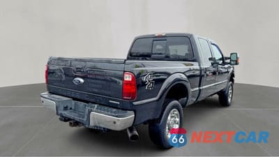 Czwarte zdjęcie samochodu z boku: 2015 FORD F350 SUPER DUTY VIN:1FT8W3B63FEC74809 - miniatura