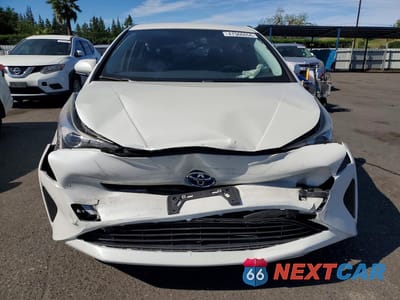 Piąte zdjęcie samochodu w środku: 2016 TOYOTA PRIUS TWO VIN:JTDKBRFU9G3013906 - miniatura