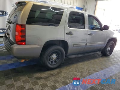 Trzecie zdjęcie samochodu z tyłu: 2009 CHEVROLET TAHOE POLICE VIN:1GNEC03059R262945 - miniatura