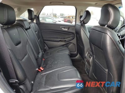 Zdjęcie 10 z 11 samochodu: 2019 FORD EDGE TITANIUM VIN:2FMPK4K91KBB60686 - miniatura