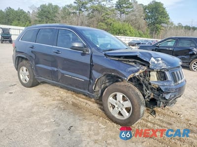 Czwarte zdjęcie samochodu z boku: 2014 JEEP GRAND CHEROKEE LAREDO VIN:1C4RJEAG9EC274493 - miniatura
