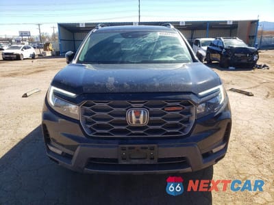 Piąte zdjęcie samochodu w środku: 2023 HONDA PASSPORT TRAIL SPORT VIN:5FNYF8H63PB028265 - miniatura