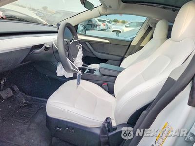 Zdjęcie 7 z 12 samochodu: 2023 TESLA MODEL Y VIN:7SAYGDEE5PF810958 - miniatura