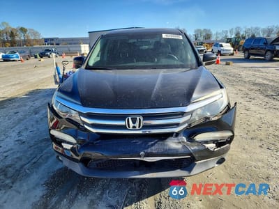 Piąte zdjęcie samochodu w środku: 2017 HONDA PILOT EXLN VIN:5FNYF5H78HB000230 - miniatura