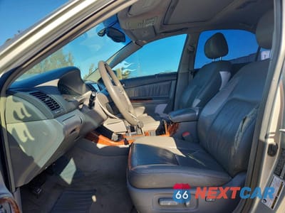 Zdjęcie 7 z 12 samochodu: 2004 TOYOTA CAMRY XLE V6 VIN:JTDBF32K740152595 - miniatura