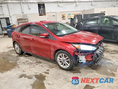 Czwarte zdjęcie samochodu z boku: 2016 FORD FOCUS SE VIN:1FADP3K28GL232020 - miniatura