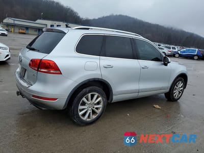 Trzecie zdjęcie samochodu z tyłu: 2014 VOLKSWAGEN TOUAREG V6 VIN:WVGEF9BP2ED015260 - miniatura