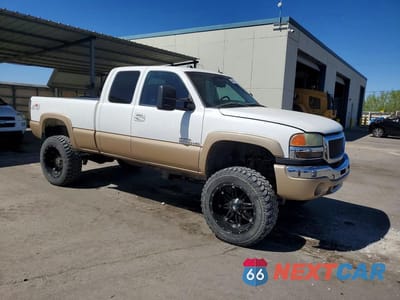 Czwarte zdjęcie samochodu z boku: 2004 GMC SIERRA K2500 HEAVY DUTY VIN:1GTHK29G64E148039 - miniatura
