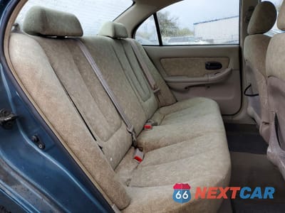 Zdjęcie 10 z 12 samochodu: 2002 HYUNDAI ELANTRA GLS VIN:KMHDN45D82U323466 - miniatura