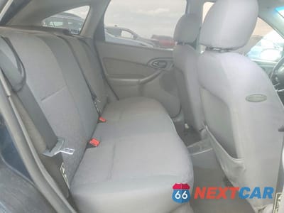 Zdjęcie 10 z 12 samochodu: 2003 FORD FOCUS VIN:3FAHP37333R106016 - miniatura