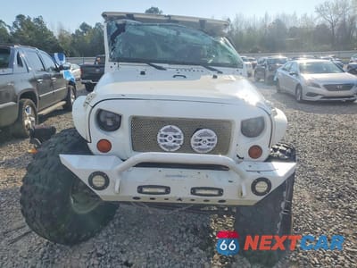 Piąte zdjęcie samochodu w środku: 2012 JEEP WRANGLER UNLIMITED SAHARA VIN:1C4HJWEG5CL113762 - miniatura