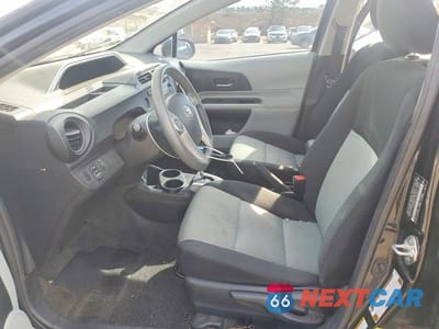 Zdjęcie 7 z 12 samochodu: 2014 TOYOTA PRIUS C TWO VIN:JTDKDTB30E1082884 - miniatura