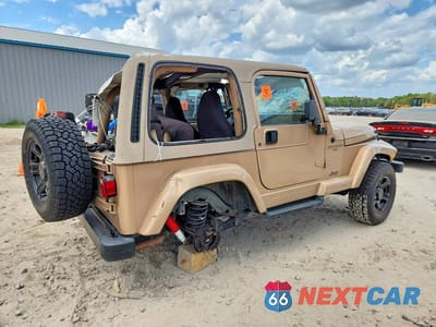 Trzecie zdjęcie samochodu z tyłu: 1999 JEEP WRANGLER / TJ SAHARA VIN:1J4FY49S4XP450485 - miniatura