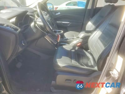 Zdjęcie 7 z 12 samochodu: 2014 FORD ESCAPE TITANIUM VIN:1FMCU0J92EUE06887 - miniatura