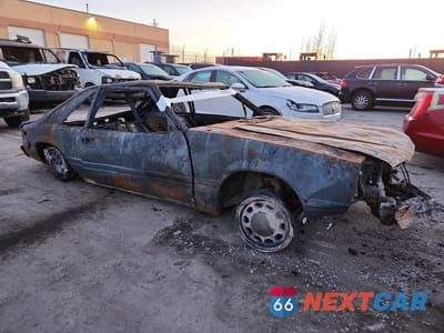 Czwarte zdjęcie samochodu z boku: 1985 FORD MUSTANG LX VIN:1FABP28M7FF247342 - miniatura