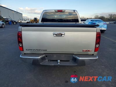 Zdjęcie 6 z 11 samochodu: 2010 GMC CANYON SLE VIN:1GTDSCDE8A8103883 - miniatura