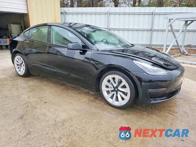 Czwarte zdjęcie samochodu z boku: 2023 TESLA MODEL 3 VIN:5YJ3E1EA8PF457981 - miniatura