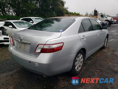 Trzecie zdjęcie samochodu z tyłu: 2007 TOYOTA CAMRY HYBRID BASE VIN:JTNBB46K773035223 - miniatura