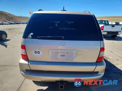 Zdjęcie 6 z 13 samochodu: 2002 MERCEDES-BENZ ML 320 VIN:4JGAB54E62A338691 - miniatura