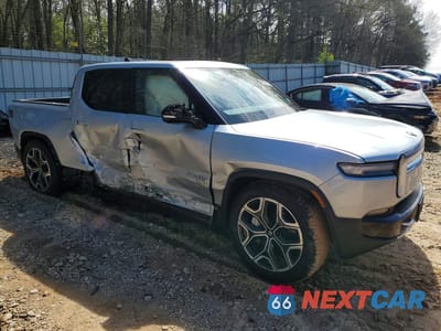 Czwarte zdjęcie samochodu z boku: 2025 RIVIAN R1T ADVENTURE VIN:7FCTGBAA0SN035357 - miniatura