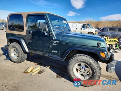 Czwarte zdjęcie samochodu z boku: 2002 JEEP WRANGLER / TJ SPORT VIN:1J4FA49S32P731769 - miniatura