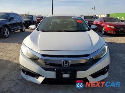 Piąte zdjęcie samochodu w środku: 2016 HONDA CIVIC TOURING VIN:19XFC1F96GE011566 - miniatura