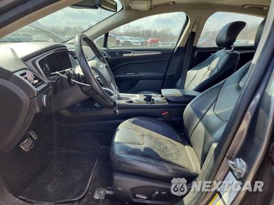 Zdjęcie 7 z 12 samochodu: 2014 FORD FUSION TITANIUM VIN:3FA6P0K9XER351982 - miniatura