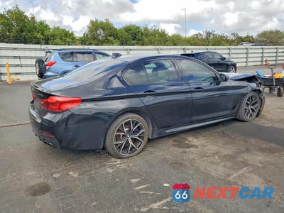 Trzecie zdjęcie samochodu z tyłu: 2021 BMW M550XI VIN:WBA13BK03MCG26571 - miniatura