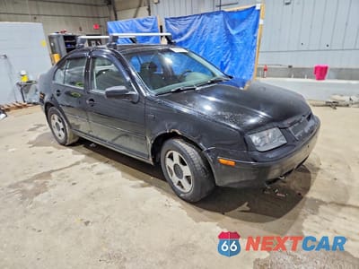 Czwarte zdjęcie samochodu z boku: 2001 VOLKSWAGEN JETTA GLS TDI VIN:3VWSP69M51M131238 - miniatura