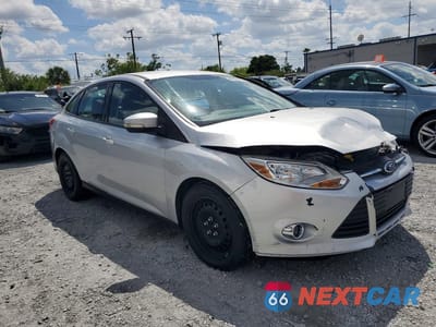 Czwarte zdjęcie samochodu z boku: 2012 FORD FOCUS SE VIN:1FAHP3F26CL124520 - miniatura