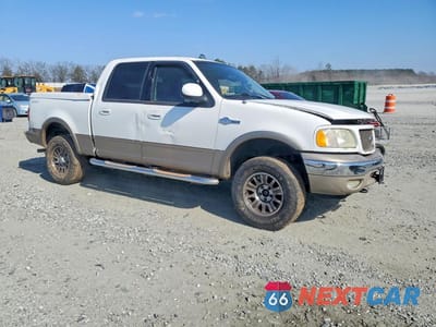 Czwarte zdjęcie samochodu z boku: 2003 FORD F150 VIN:1FTRW08L93KD30796 - miniatura
