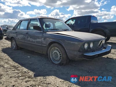 Czwarte zdjęcie samochodu z boku: 1986 BMW 3 SERIES VIN:WBADB7403D1047082 - miniatura