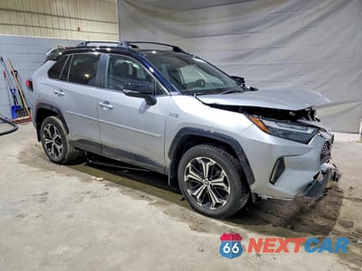 Czwarte zdjęcie samochodu z boku: 2022 TOYOTA RAV4 PRIME XSE VIN:JTMFB3FV5ND099858 - miniatura